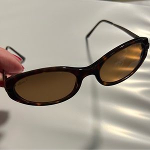 Revo sunglasses! Oval shape, brown tortoiseshell color. Polarized. Great shape!